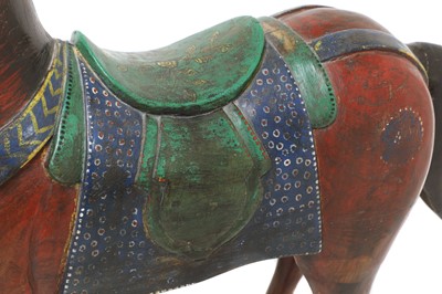 Lot 9 - An Indian polychrome painted wooden horse