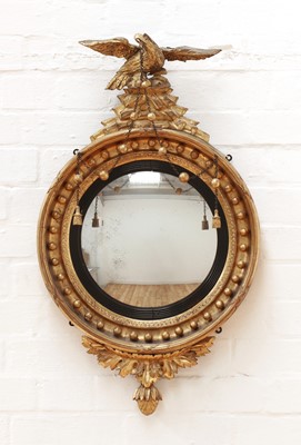 Lot 10 - A Regency giltwood convex mirror