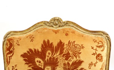 Lot 27 - A pair of French Louis XV giltwood fauteuils à la reine
