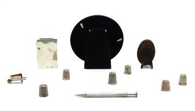 Lot 14 - A collection of novelty silver items