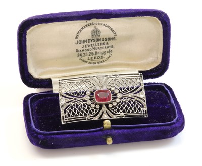 Lot 156 - An Art Deco synthetic ruby and diamond rectangular plaque brooch