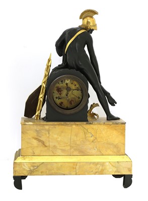 Lot 52 - A French Empire patinated and gilt-bronze and Sienna marble mantel clock