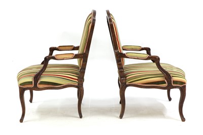 Lot 31 - A pair of French Louis XV beech fauteuils