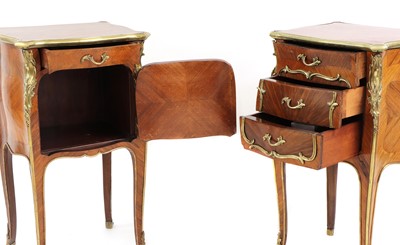 Lot 60 - A pair of French Louis XV-style kingwood and ormolu night tables