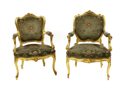 Lot 389 - Two French Louis XV-style giltwood fauteuils
