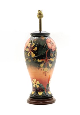 Lot 187 - A Moorcroft Oberon pomegranate pattern table lamp