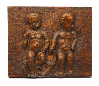 Lot 252 - A continental stained oak plaque