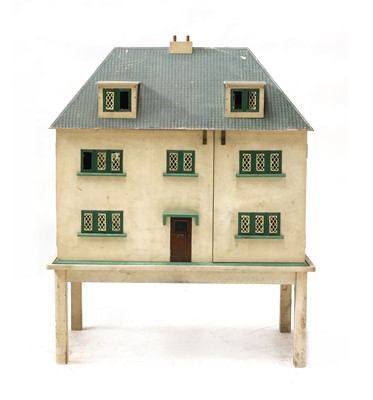 Lot 156A - A large 1930's painted wood doll's house on stand