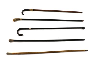Lot 162 - A collection of nine vintage walking sticks