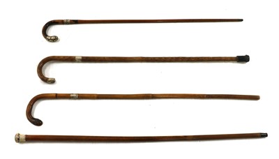 Lot 162 - A collection of nine vintage walking sticks