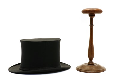 Lot 236 - A Herne Bros Ltd telescopic top hat and a beechwood hat stand