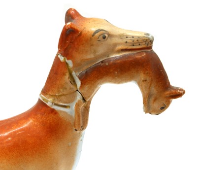 Lot 201 - Eleven Staffordshire pottery greyhounds