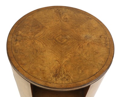 Lot 209 - An Art Deco walnut circular book table