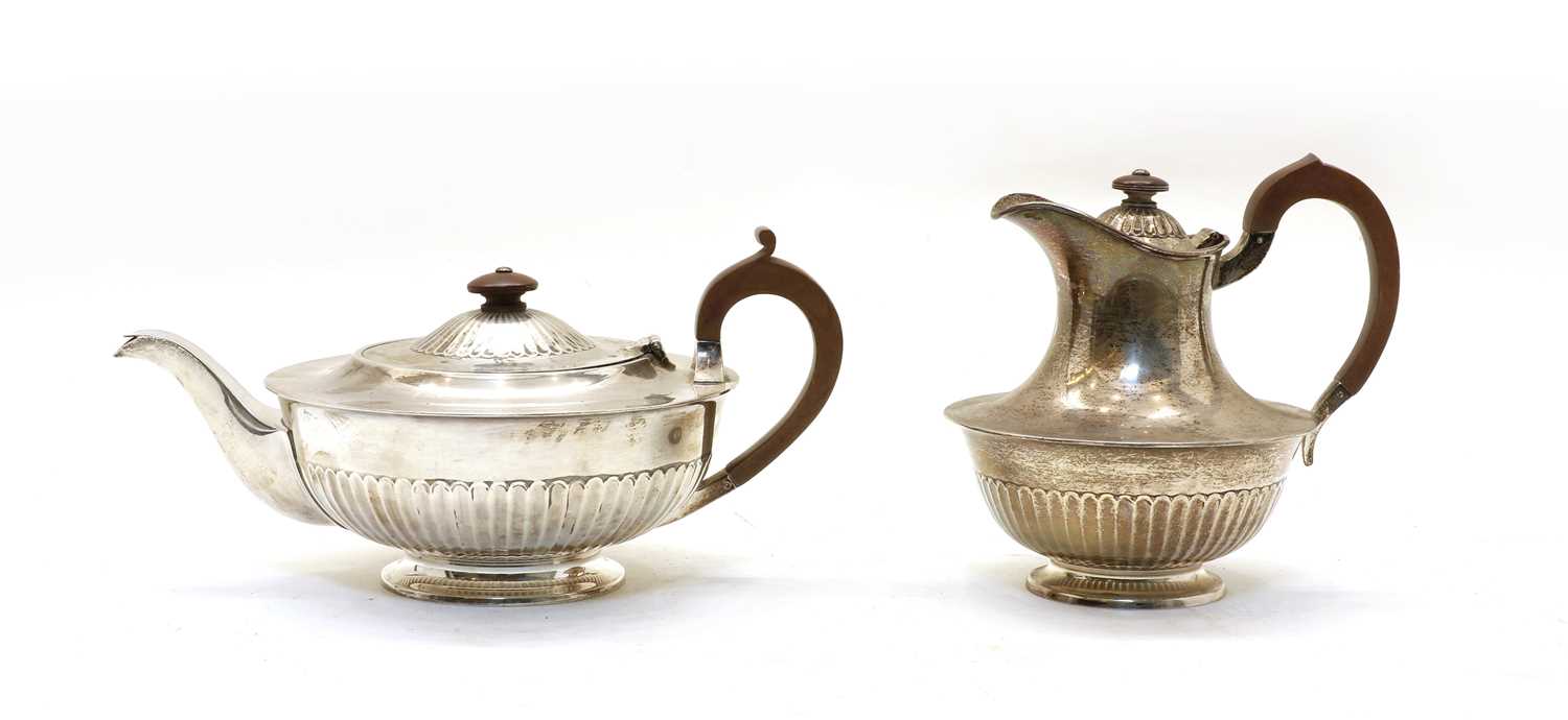 Lot 51 - A silver teapot and hot water jug