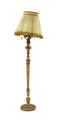 Lot 415 - A carved gilt wood standard lamp and shade