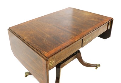 Lot 204 - A 19th century brass inlaid rosewood sofa table