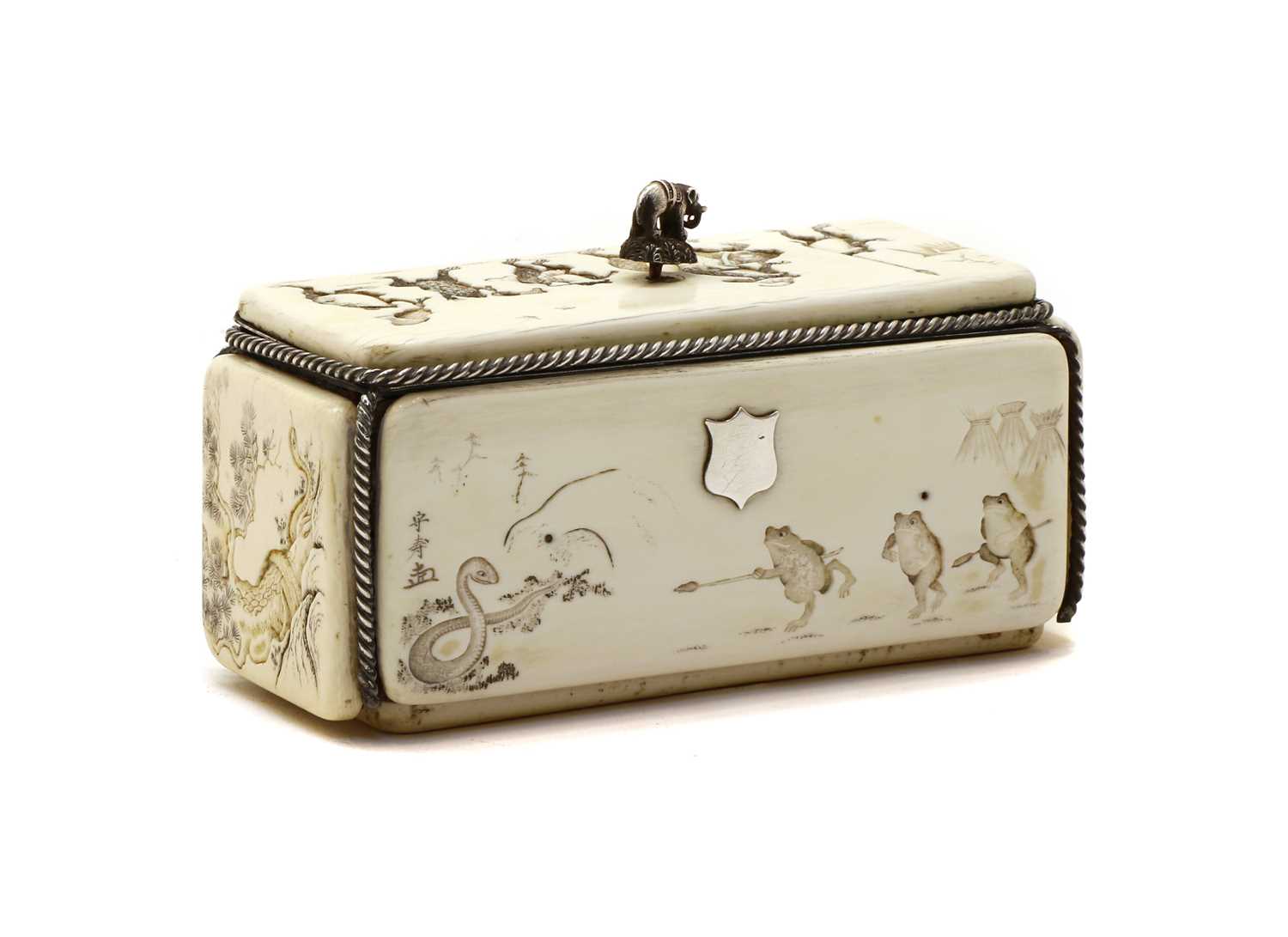 Lot 69 - A Japanese carved ivory and silver mounted box