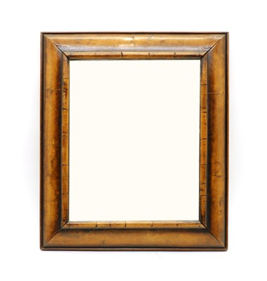 Lot 315 - A walnut cushion framed wall mirror