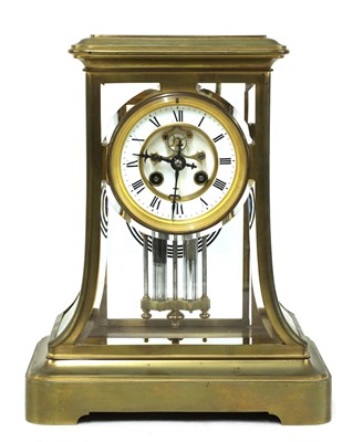 Lot 718 - A French brass four-glass mantel clock