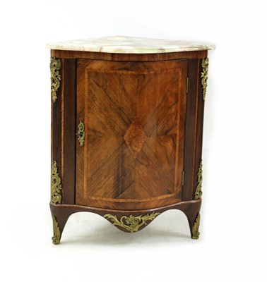 Lot 489 - A French walnut bow front corner cupboard