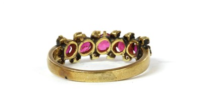 Lot 112 - A gold ruby and diamond ring