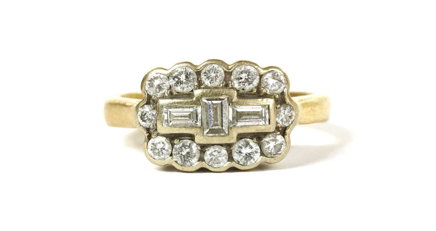 Lot 50 - A gold diamond cluster ring