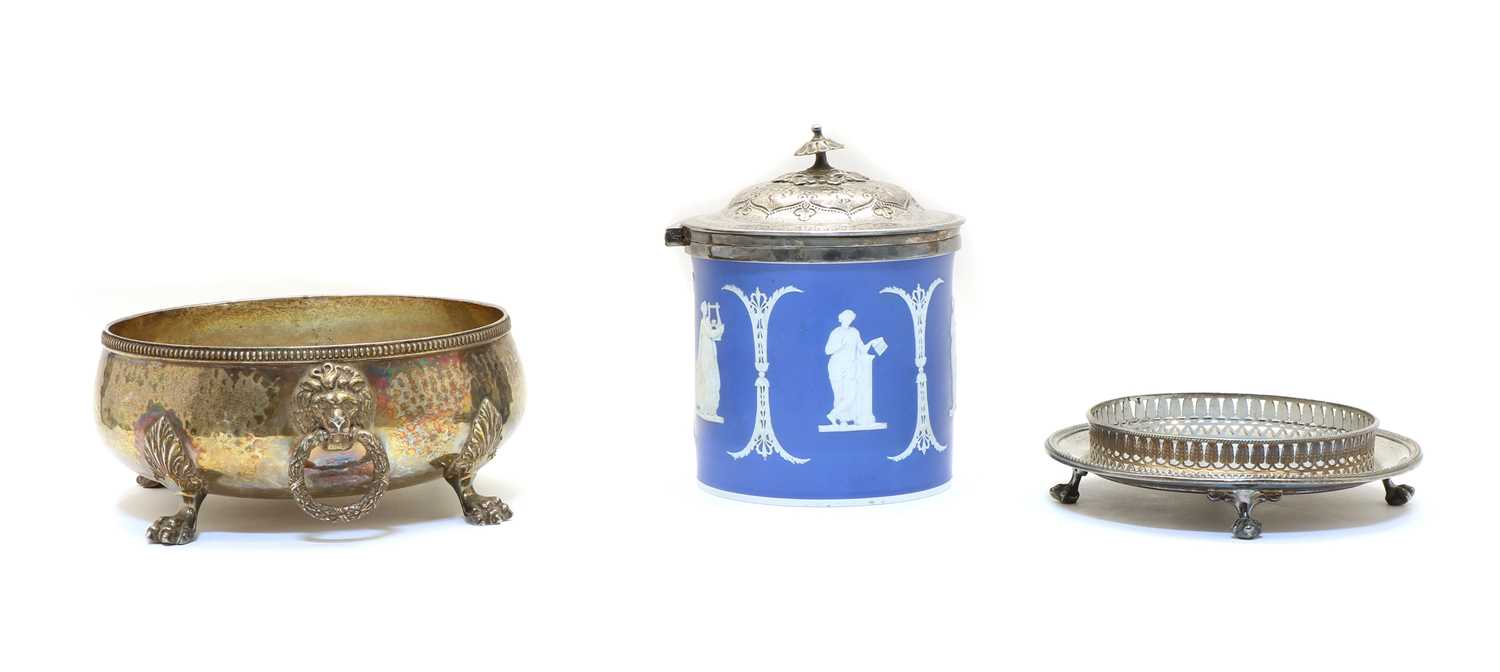 Lot 16 - A blue and white jasperware and silver plated biscuit barrel