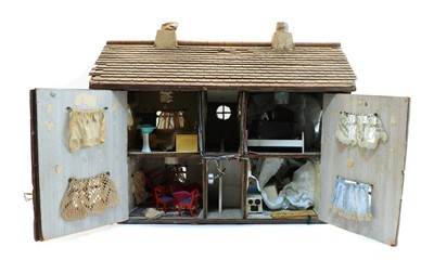 Lot 263 - A 1950's cottage style dolls house