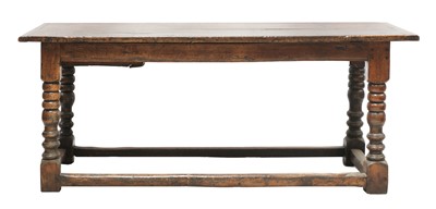 Lot 214 - An oak refectory table