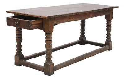 Lot 214 - An oak refectory table