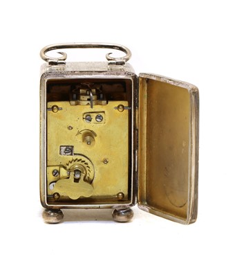 Lot 14 - A silver miniature carriage clock
