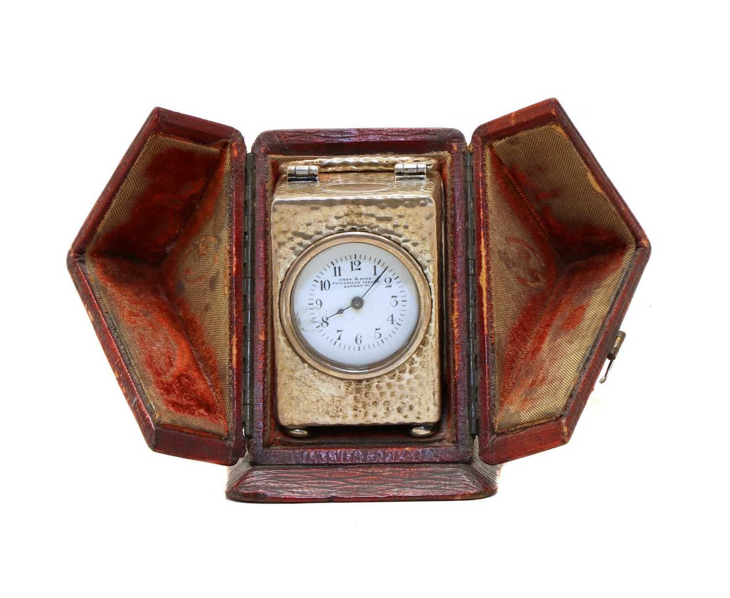 Lot 13 - An Edwardian silver miniature carriage clock