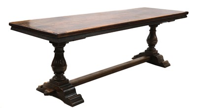 Lot 226 - A Continental walnut refectory table
