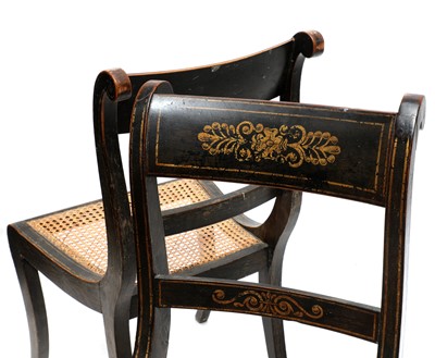 Lot 230 - A set of four Regency black japanned dining chairs