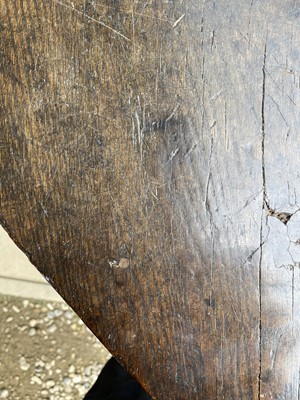 Lot 221 - A primitive elm and ash 'cheese top' cricket table