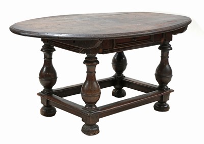 Lot 233 - An oak centre table