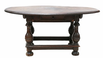Lot 233 - An oak centre table
