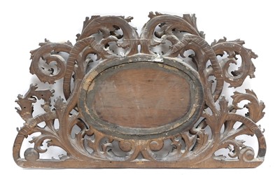 Lot 231 - An ornately pierced and carved headboard