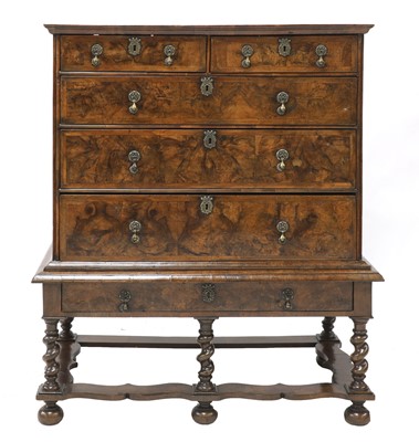Lot 575 - A William and Mary walnut and feather-banded chest on stand