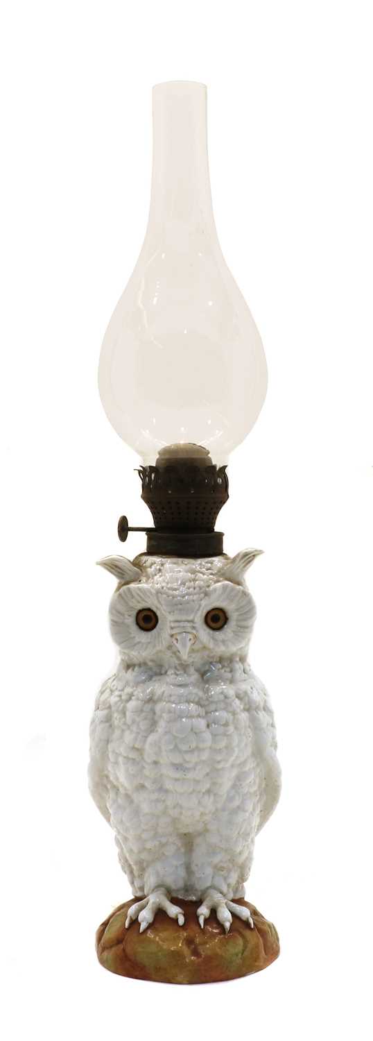 Lot 89 - A late 19th/early 20th century continental white porcelain owl oil lamp