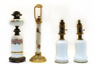 Lot 176 - Four Victorian and Edwardian oil lamps