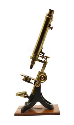 Lot 64 - A Victorian lacquered brass binocular microscope