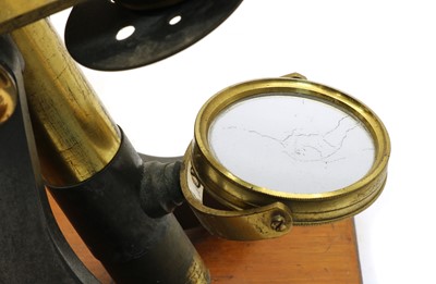 Lot 64 - A Victorian lacquered brass binocular microscope
