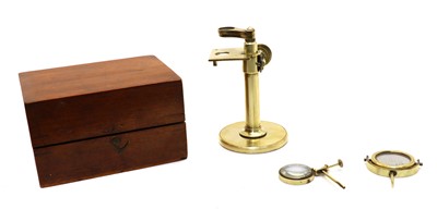 Lot 65 - A mahogany cased lacquered brass microscope