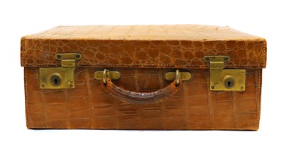 Lot 31 - An Edwardian crocodile leather vanity case