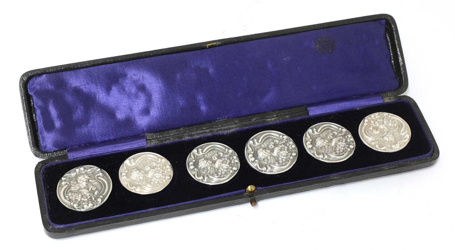 Lot 27 - A cased set of six Art Nouveau silver buttons
