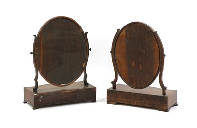 Lot 223 - Two George III mahogany dressing table mirrors