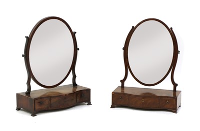 Lot 223 - Two George III mahogany dressing table mirrors