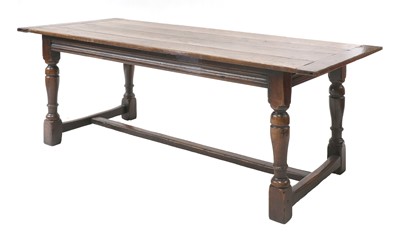 Lot 654 - An oak refectory table