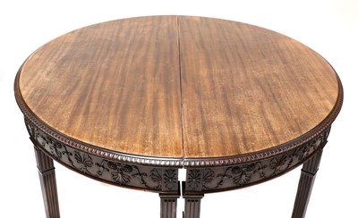 Lot 465 - A pair of Adam Revival mahogany demilune console tables